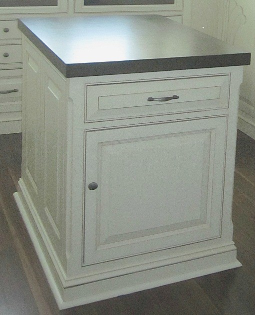 Quarter Round painted white around base of island closet cabinet Quarter Round painted white around base of island closet cabinet